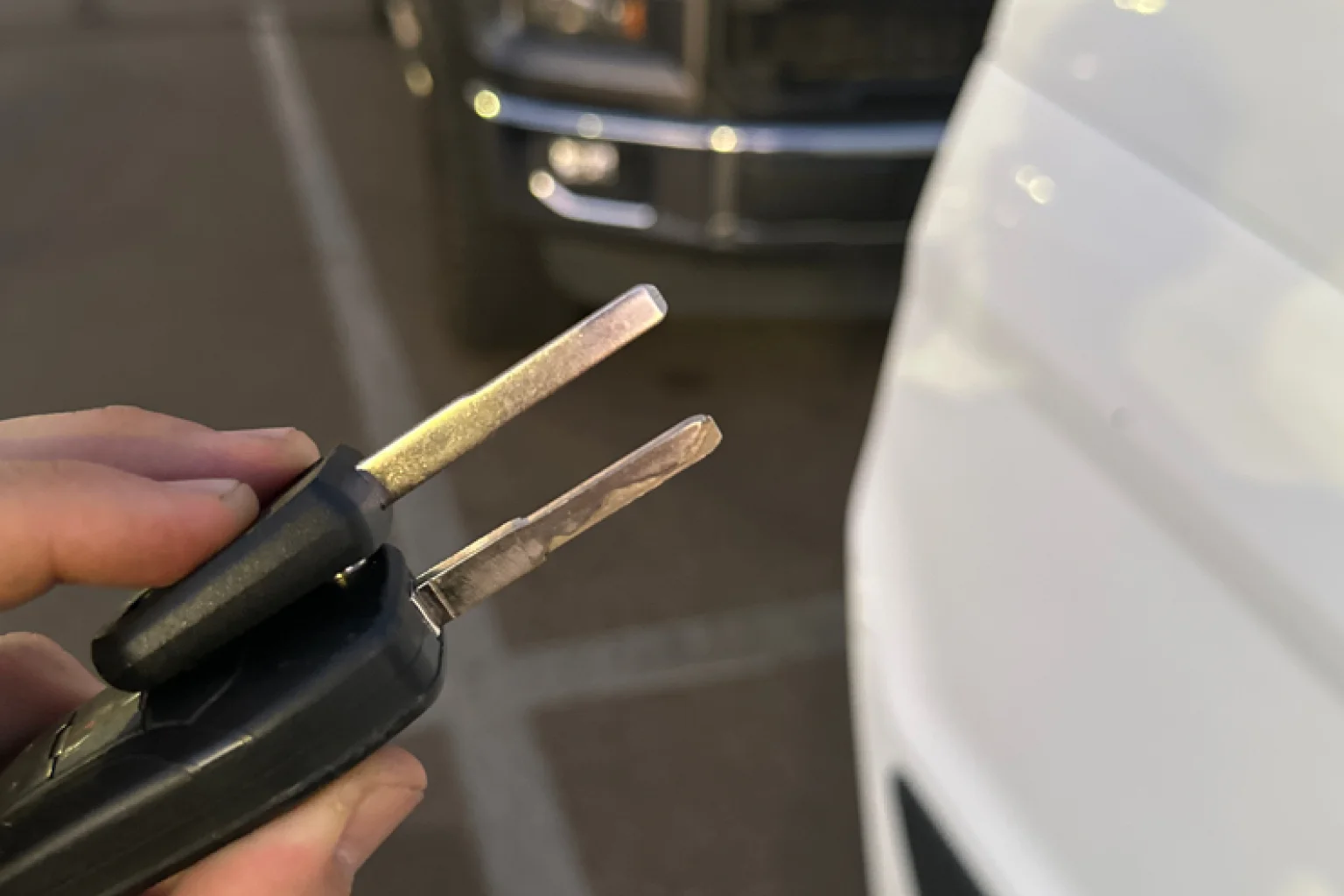 Car key duplication service with van in background